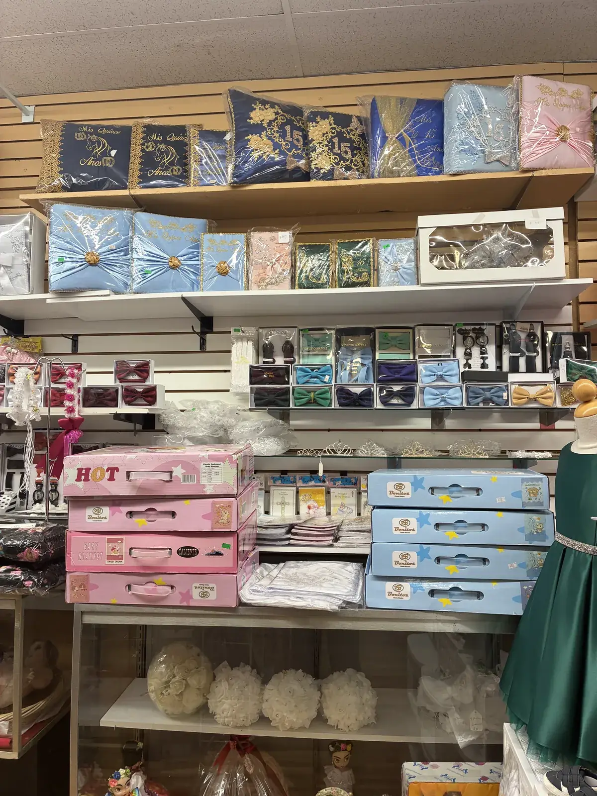 Baptism & first communion accessories on display at Yessenia’s Fashion