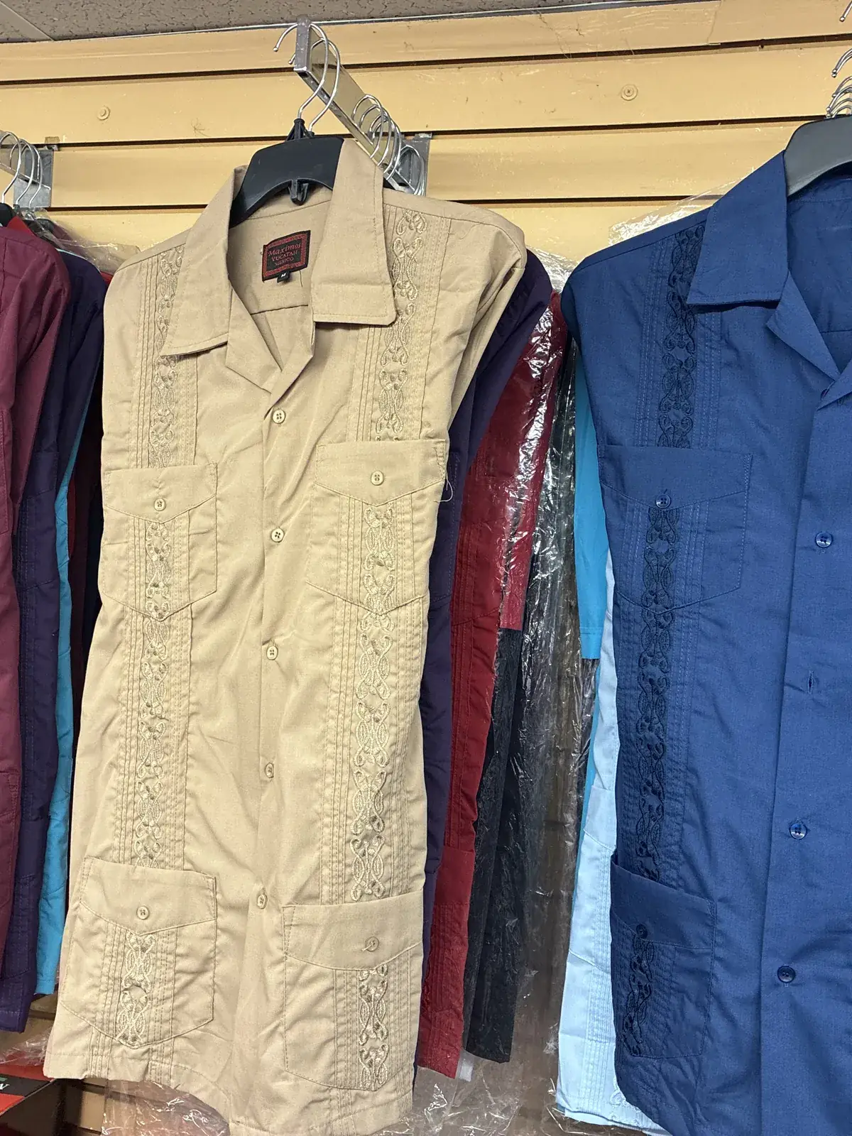 Guayabera shirts on display at Yessenia’s Fashion