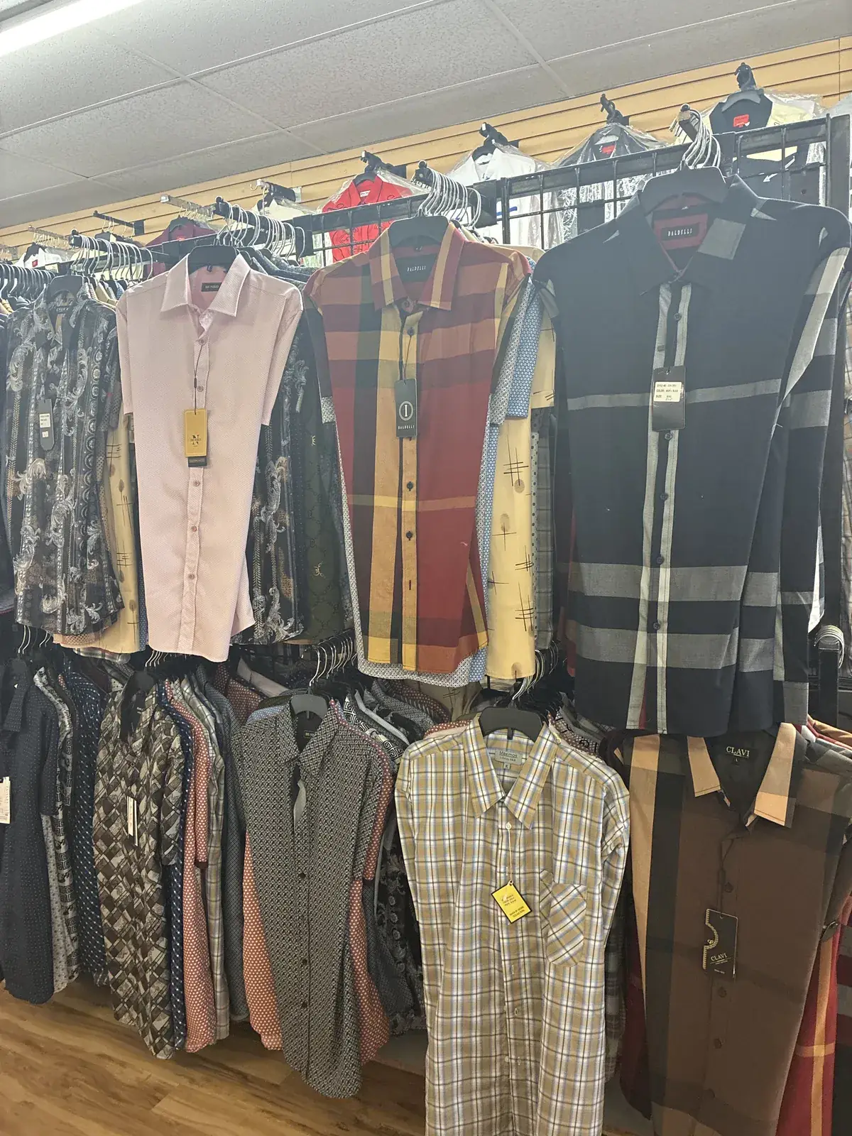 Men’s dress shirts on display at Yessenia’s Fashion