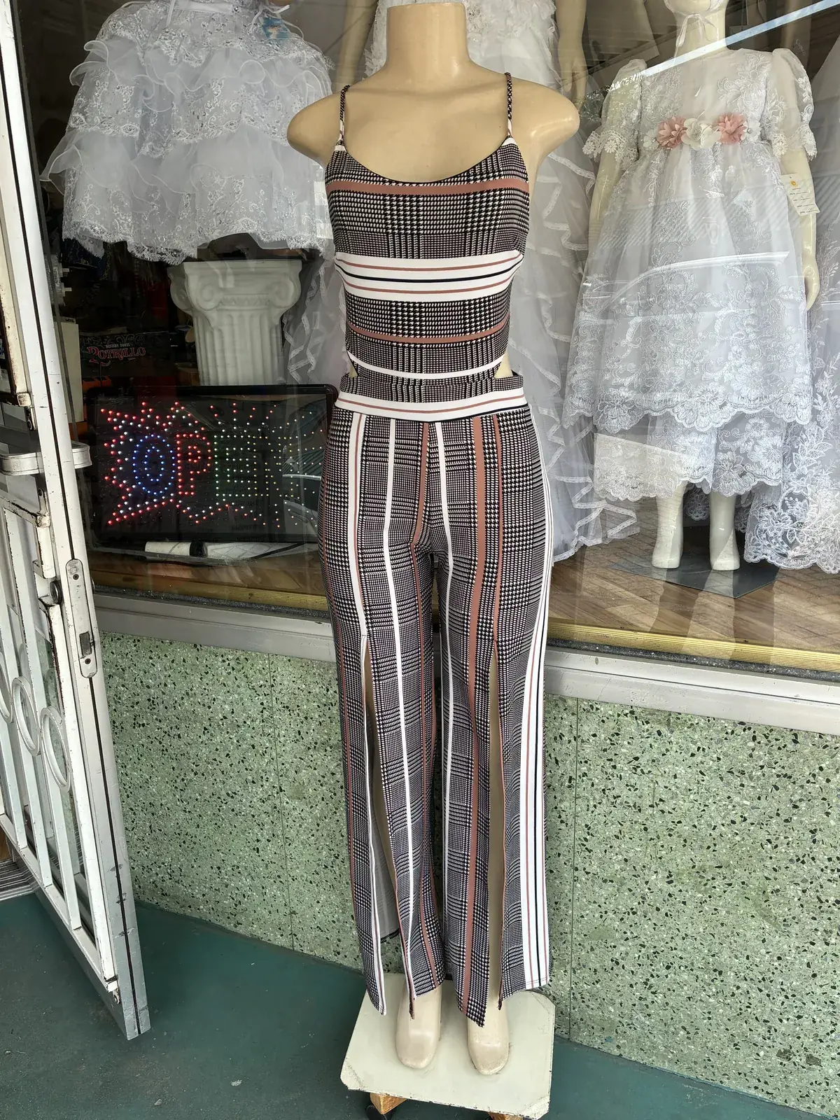 Striped wide-leg jumpsuit on display at Yessenia’s Fashion